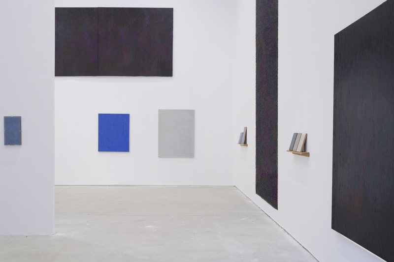 Headnotes - Curated by Schumacher and Hoyos; Bigger than—Monochrome No5, 2024, oil on canvas, 220 × 470 cm; Bigger than—Monochrome No6, 2025, oil on canvas, 197 × 412 cm; Standing with a Painting No11, 2025, ink and oil on plexiglas and wood, 45 × 27 cm; Easel Painting—Blue No5, 2025, oil on canvas, 110 × 90 cm; Easel Painting—White No4, 2023, oil on canvas, 137 × 103 cm — installation view, Headnotes, Suprainfinit Gallery, 2025